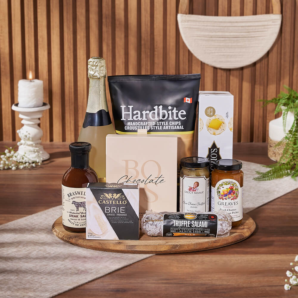 Deluxe Sparkling Wine Gift Basket with Gourmet Snacks and Teak Serving Board – how the gift is presented