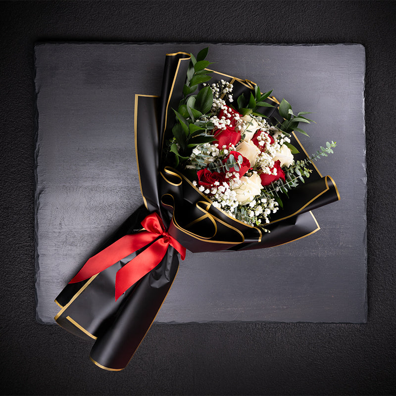 Fresh floral designs assembled locally.