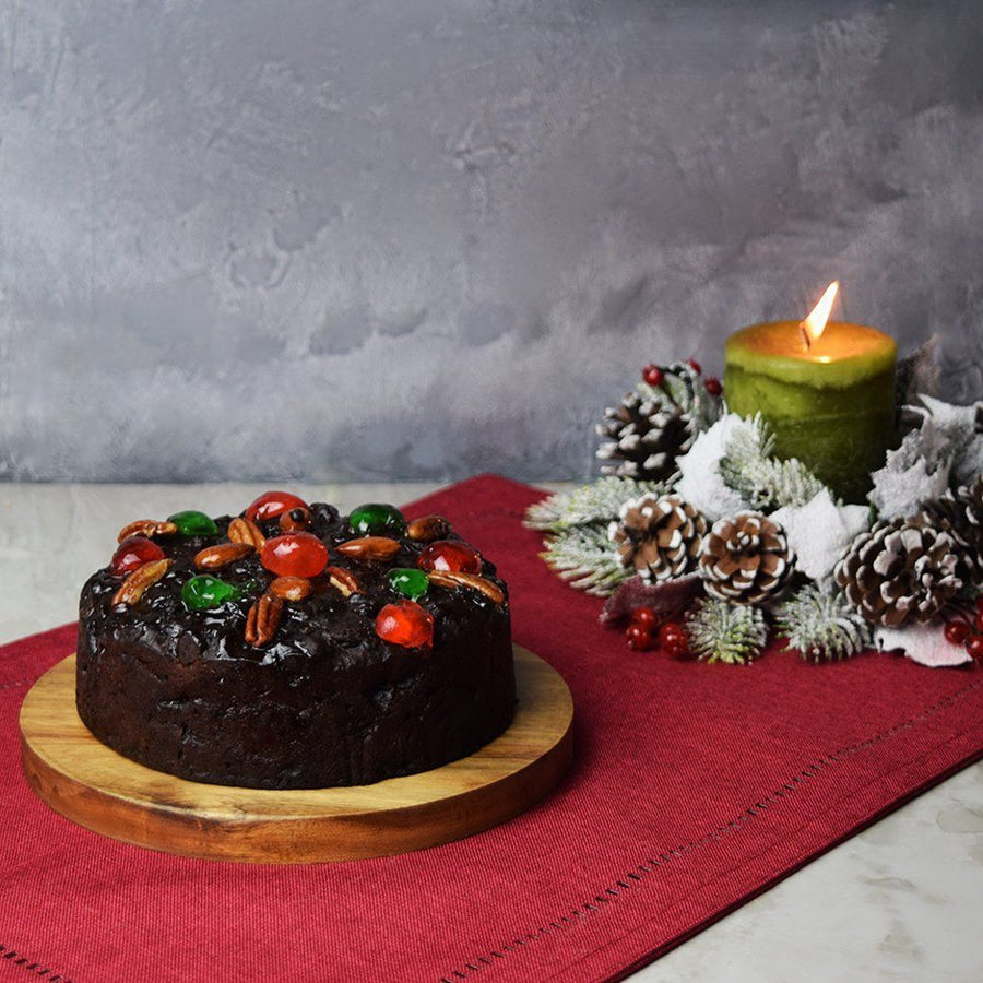 A holiday classic, the Olde English Dark Fruitcake is just what’s needed to make the Christmas season taste like it should. Featuring candied and dried fruits, nuts, and spices and soaked in rum, this large fruitcake is perfect for sharing with family and friends during the holidays from Vancouver Baskets - Vancouver Delivery