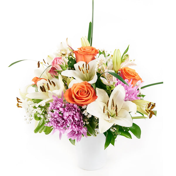 Vase arrangement — flowers gift direction, illustrative; contents vary
